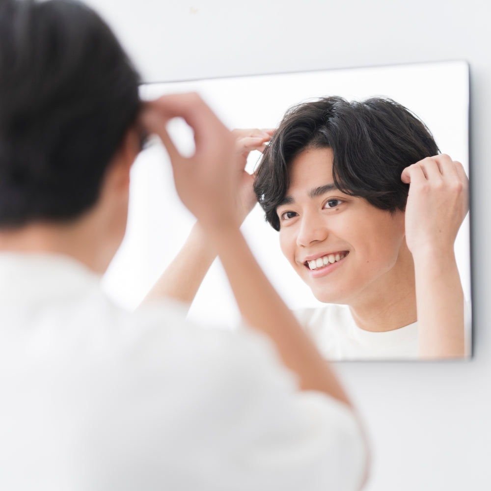 How to Style Your Hair with Wax: Male Guide